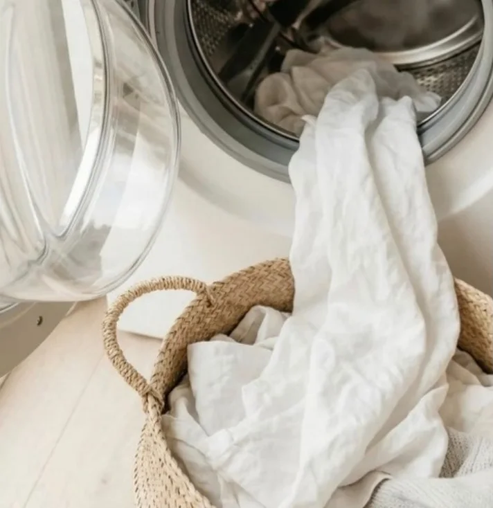 Fresh linen in a laundry basket